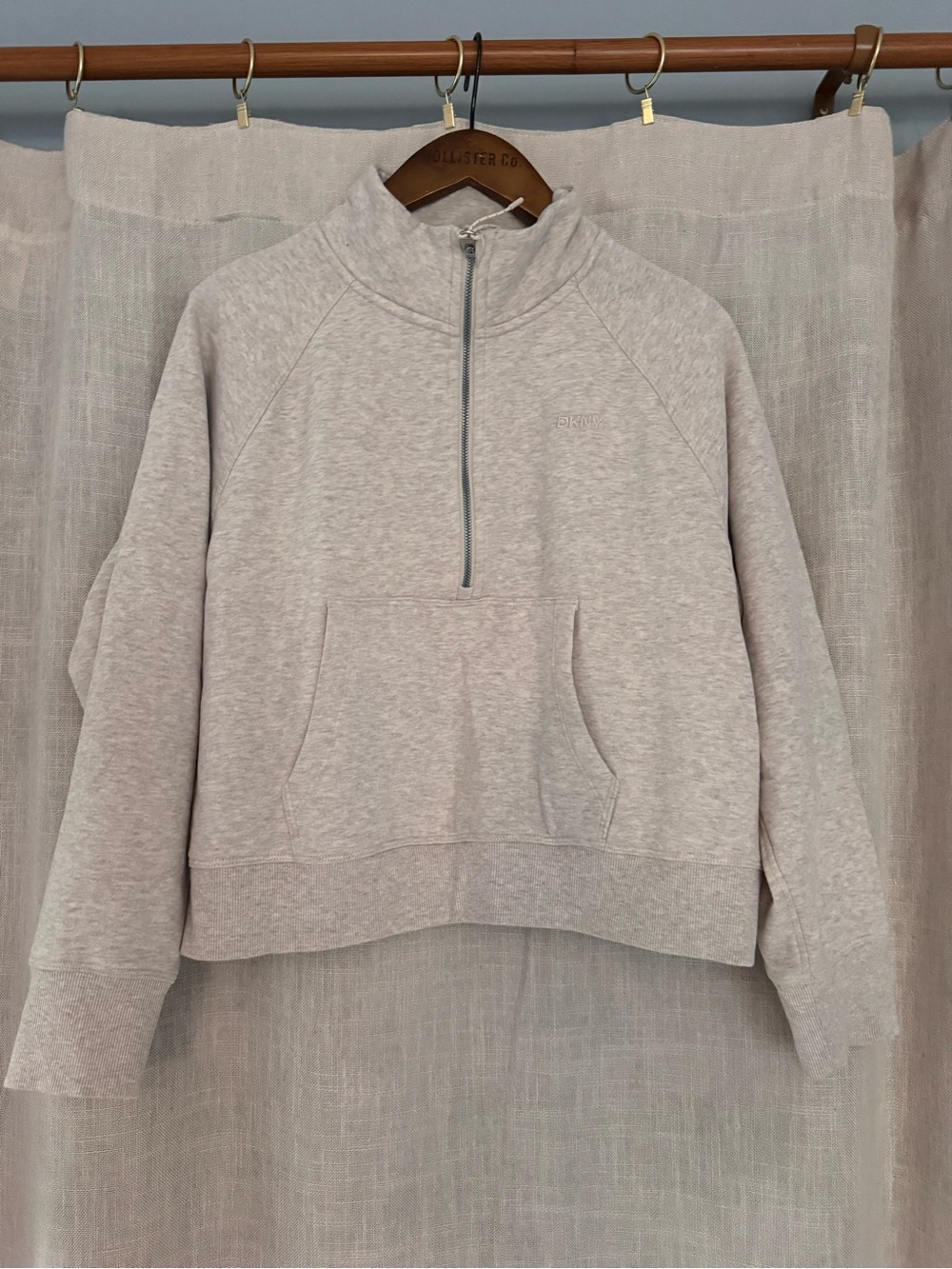 DKNY light grey quarter zip with front pocket size large